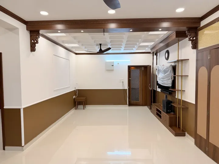 Open living area with timber storage and ceiling detail