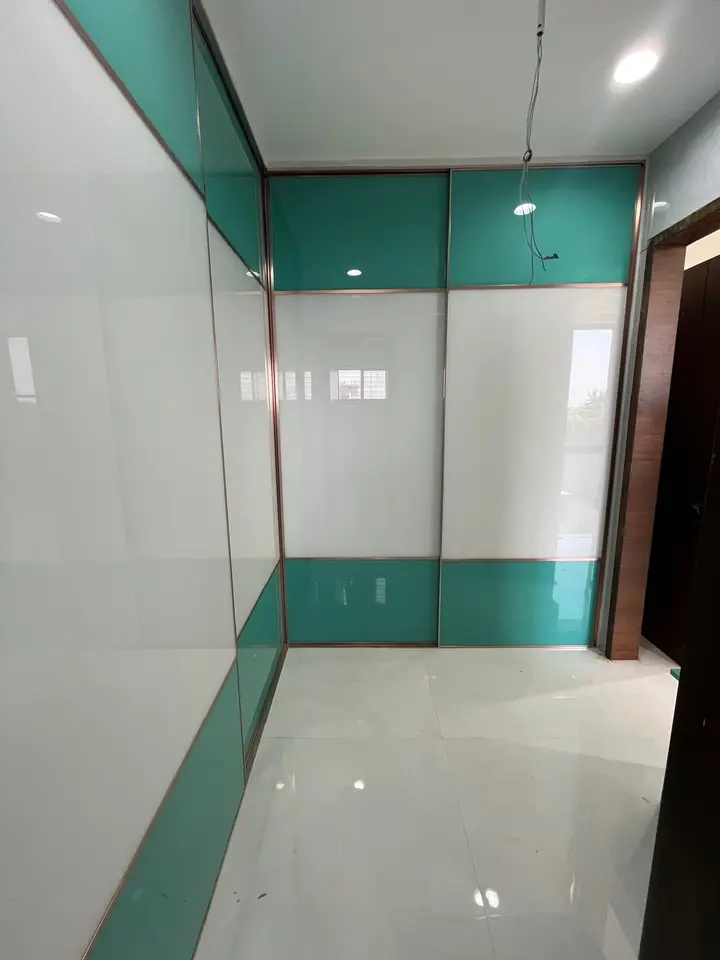 White and teal glass wardrobe doors