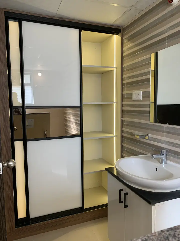 Vanity and wardrobe with mirrored and frosted glass