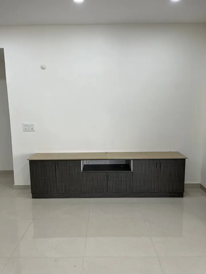 Low TV console in charcoal laminate