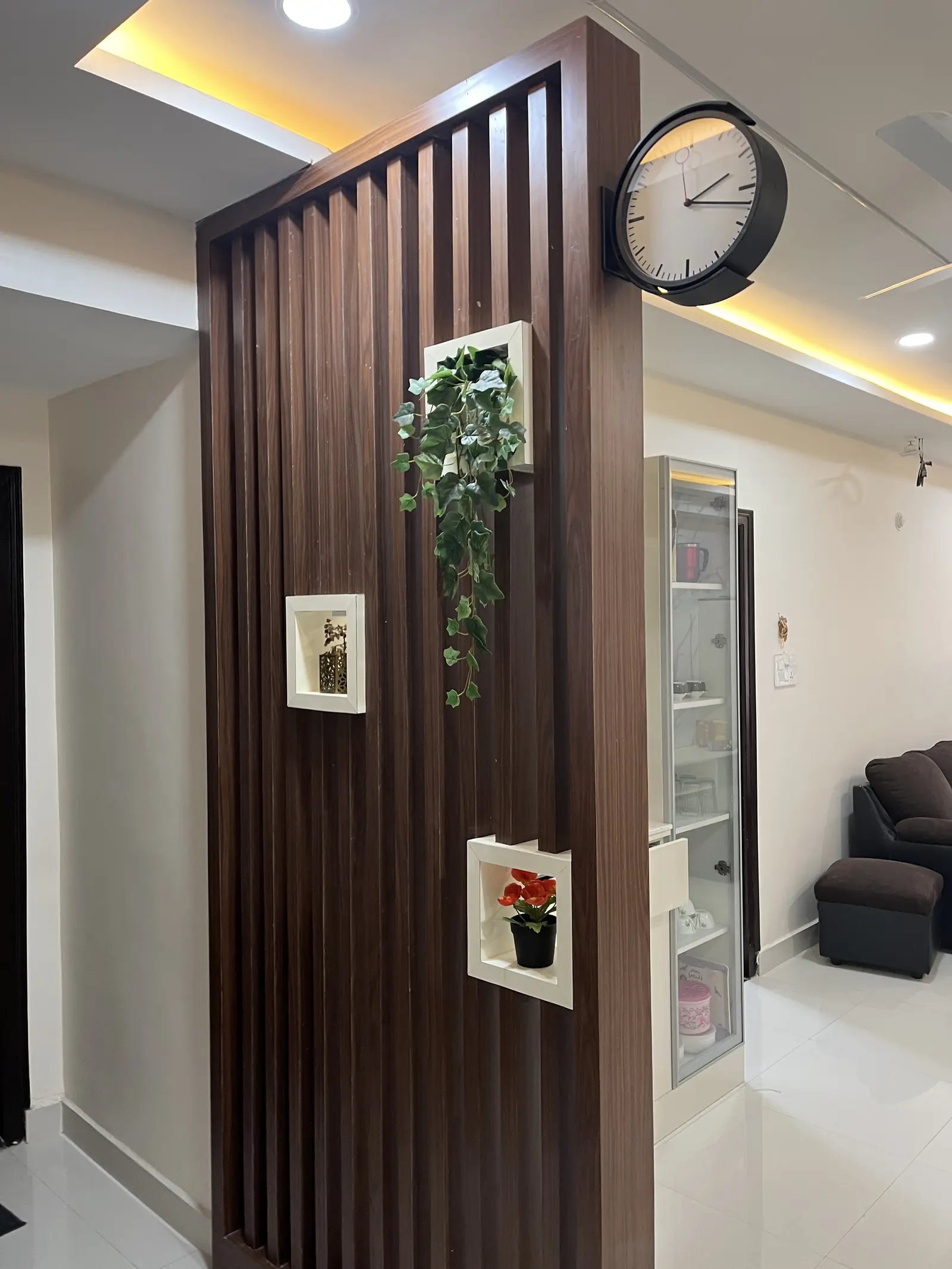Fluted timber partition with white shelves