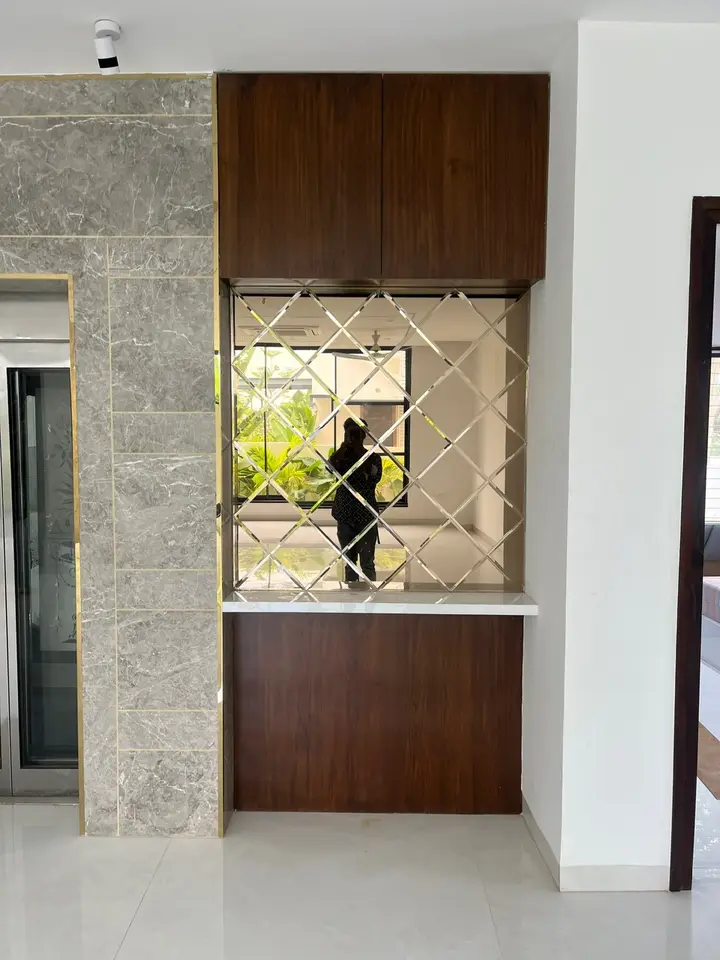 Marble-clad niche with a timber shelf