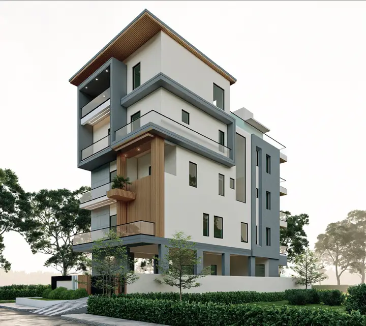 Four-storey building with grey and white balconies