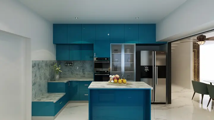 Blue kitchen with a stone backsplash and tall fridge