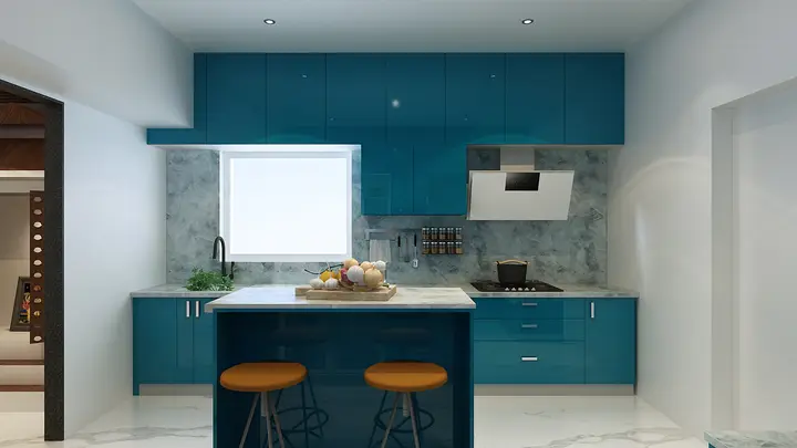 Blue kitchen island with orange stools