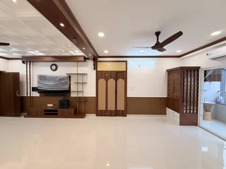 Wide view across the living room and timber storage
