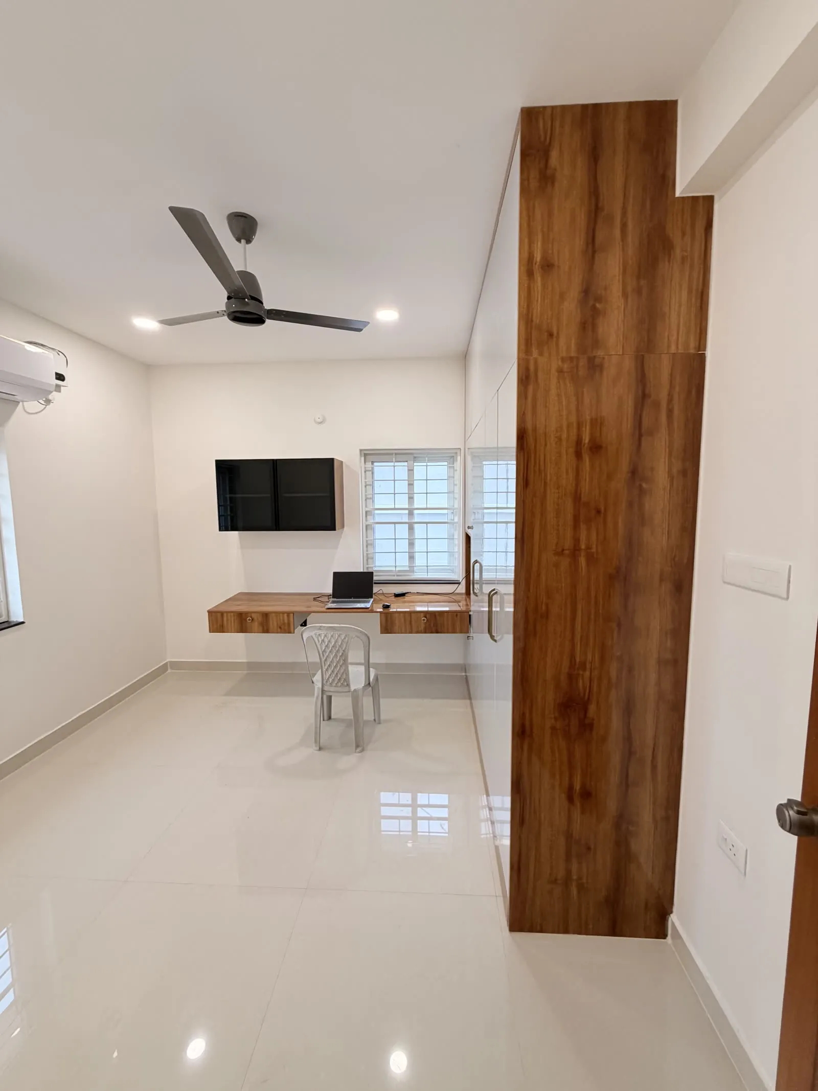 Living area viewed through a timber-finished doorway