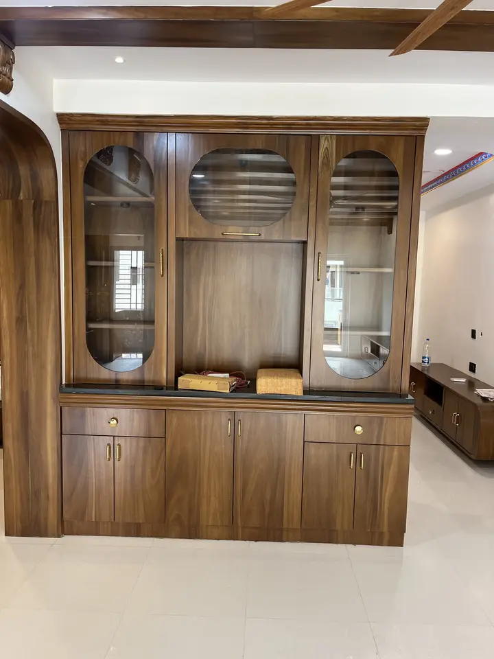 Walnut display cabinet with glazed doors