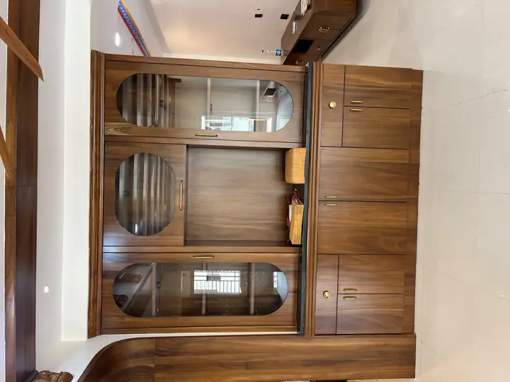 Walnut TV unit with open shelves and cabinets