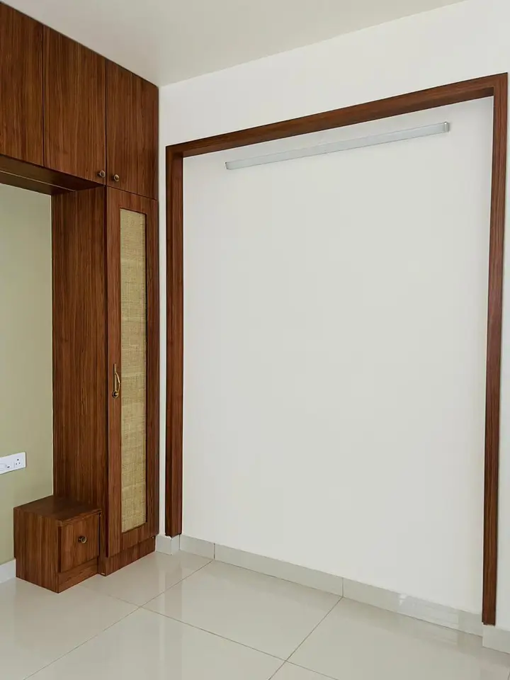 Walnut niche with a plain white panel
