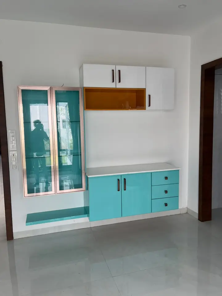 Teal and white crockery unit with timber accents